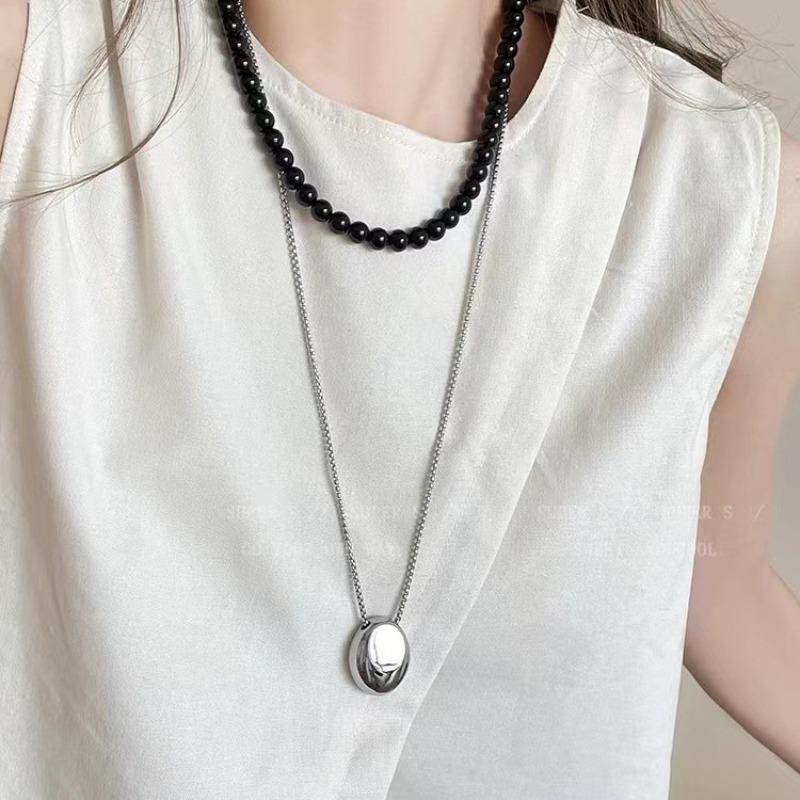 Waterdrop Pendant Titanium Steel Necklace for Women - Elegant and Exclusive Accessory for Light Luxury Fashion, Long Sweater Chain