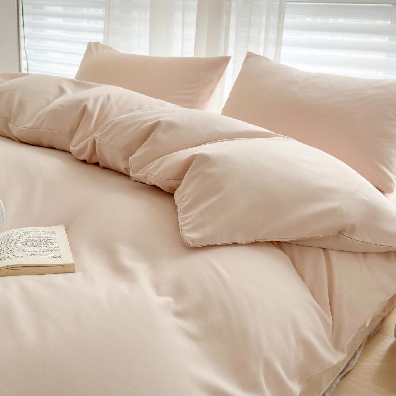Solid Color Sanded Bedding Set: Four-Piece Set with Quilt Cover and Washed Spring Sheets.