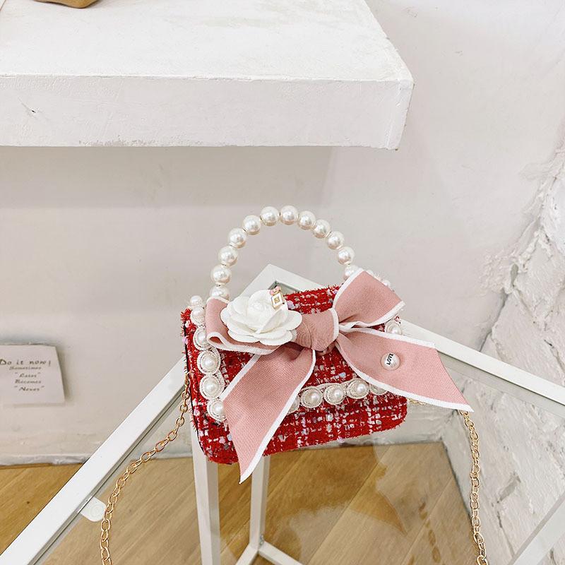 Stylish Mini Girls Handbag With Pearl Bow Design For Fashionable Princesses In Black And White Colors