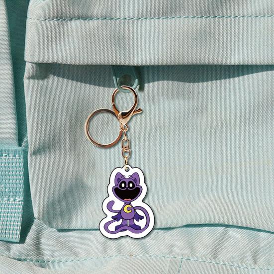 Брелок с изображением улыбающегося животного — фото 6