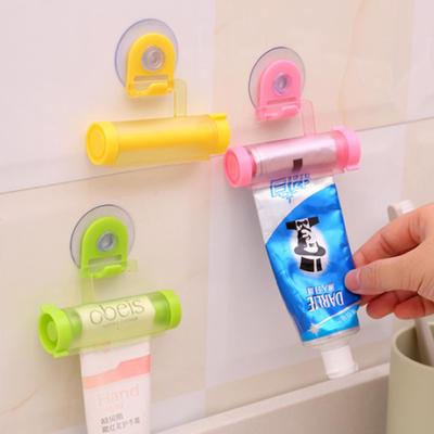 1 Pc Rolling Squeezer Toothpaste Dispenser Tube Sucker Hanging Holder ARI