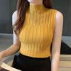 Colete de malha slim fit sem mangas retrô feminino com meia gola alta