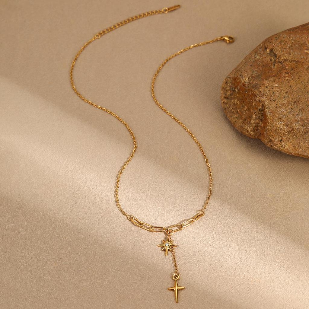 Hot-Selling Eight-Pointed Star Necklace: Gold-Plated Copper Tassel with Diamond-Studded Cross Pendant on Minimalist Clavicle Chain.