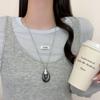 Dark Pattern Water Drop Tassel Pendant Necklace - Women's 2026 Light Luxury Fashion, Long Holiday Style