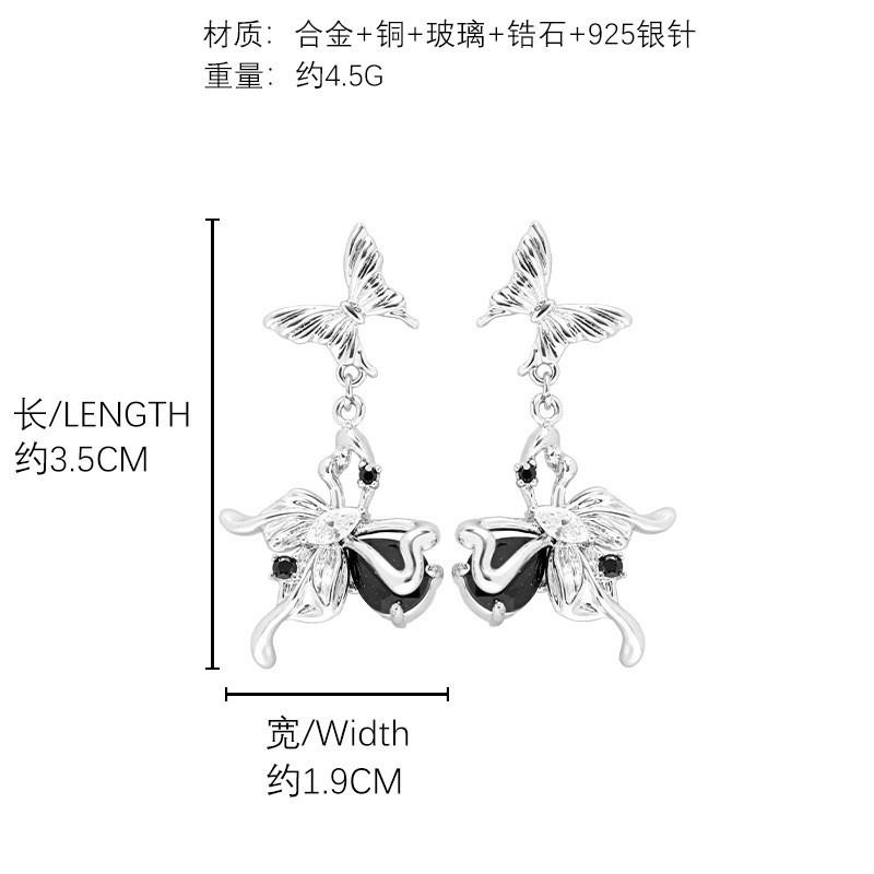 Black and white contrasting color hollow butterfly earrings exquisite 925 silver needle stud earrings personalized trend cold earrings