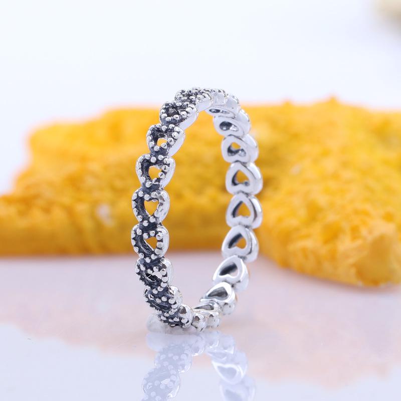 Pan Jia Silver-Plated Heart-to-Heart Ring: European  American Creative Style for Women 60#