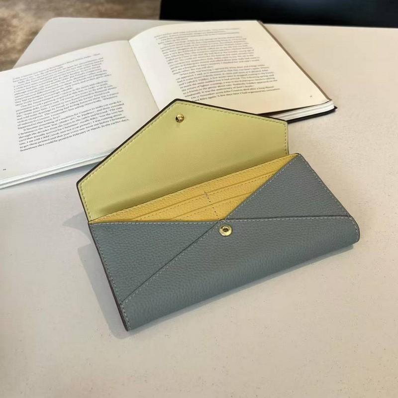 Genuine Leather Wallet. First Layer Cowhide Lychee Pattern Envelopes Spliced With Contrasting Colors. Long Three-fold Wallet