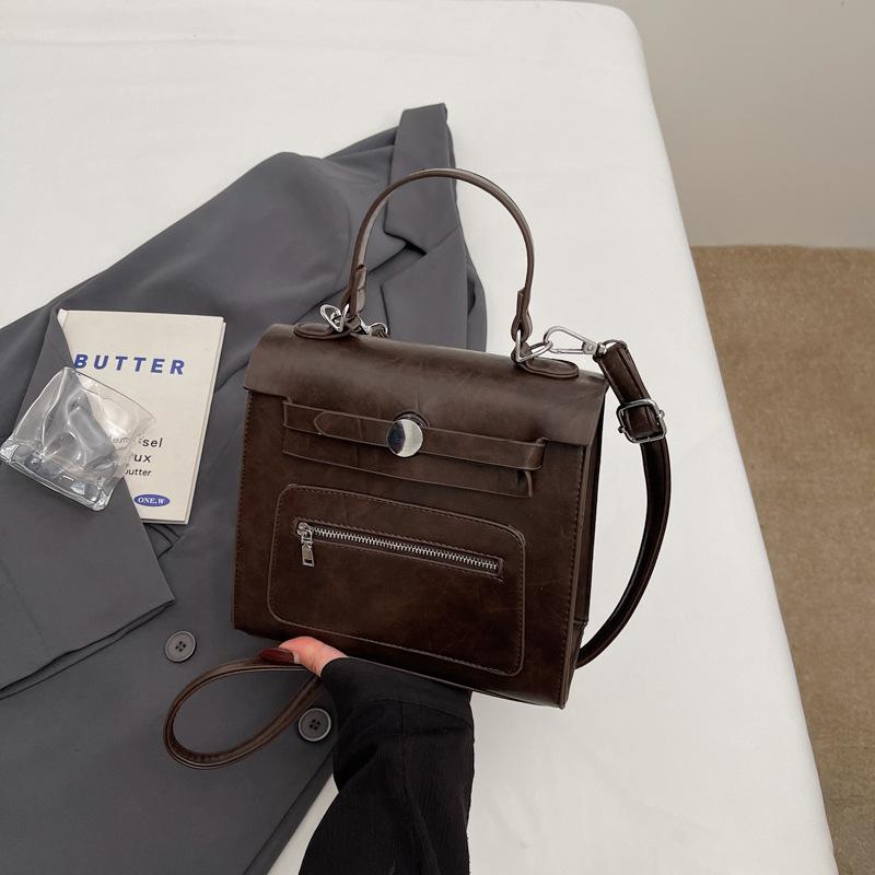 

Текстурированный ретро нишевый дизайн портативная сумка Kelly 2025 осень новая трендовая модная плечевая сумка мессенджер женская сумка прилив темно-коричневого