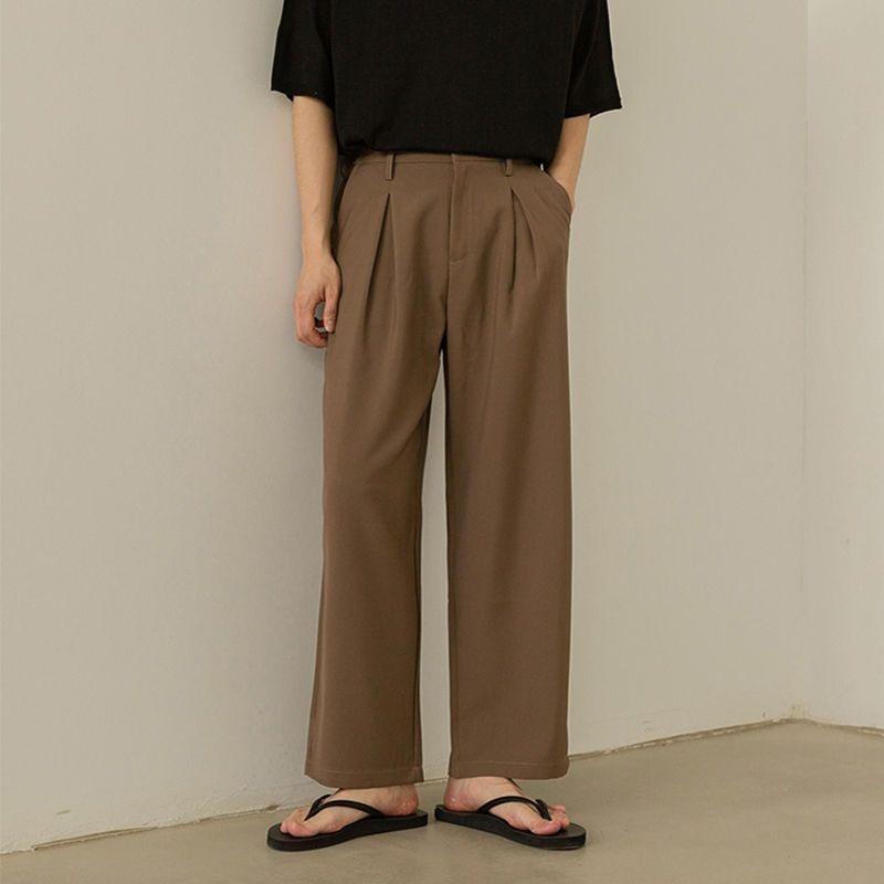 Pantaloni da uomo minimalisti a gamba larga a vita alta pieghettati vestibilità morbida tinta unita marrone casual per l'abbigliamento quotidiano da strada