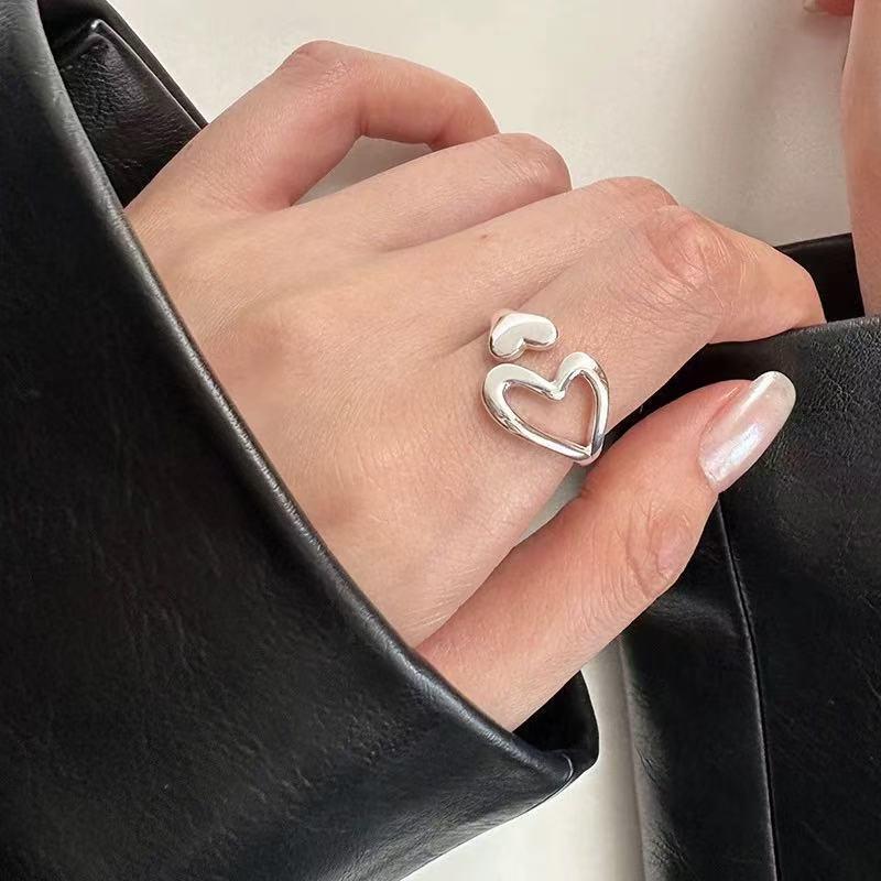 2025 Women's Adjustable Hollow Heart Ring: Stylish & Personalized Design