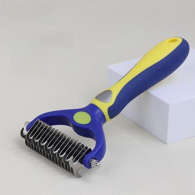 Peine de doble cara para desenredar y cuidar mascotas, ideal para perros y gatos.