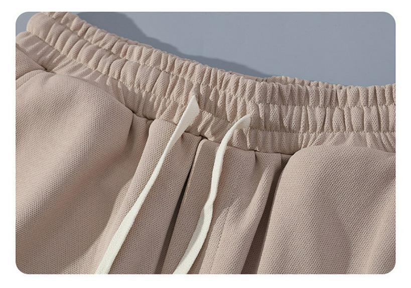 High-End Summer Youth Casual Two-Piece: Arc Hem Shorts & Short Sleeve T-Shirt Set