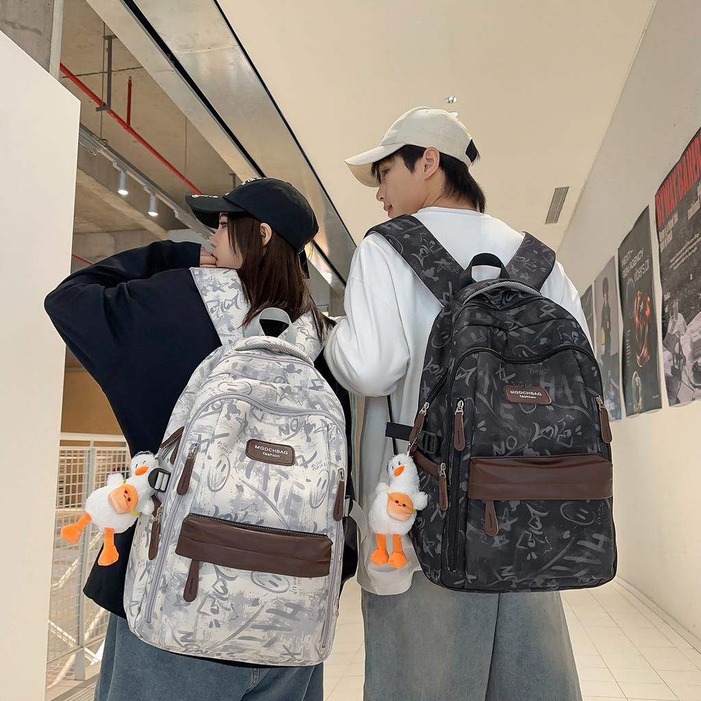 Schoolbag new junior high school schoolbag women's printed backpack large capacity leisure light travel backpack schoolbag couple