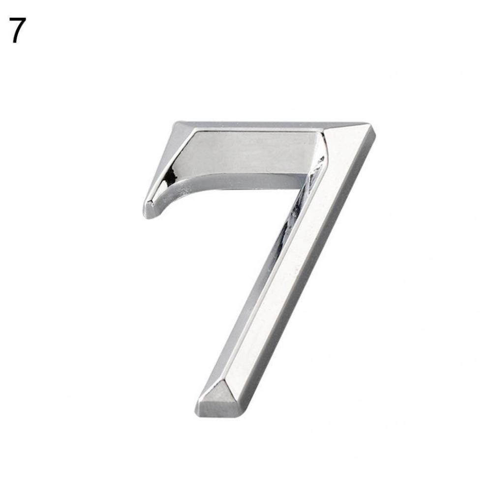 Błyszcząca tabliczka z numerem domu