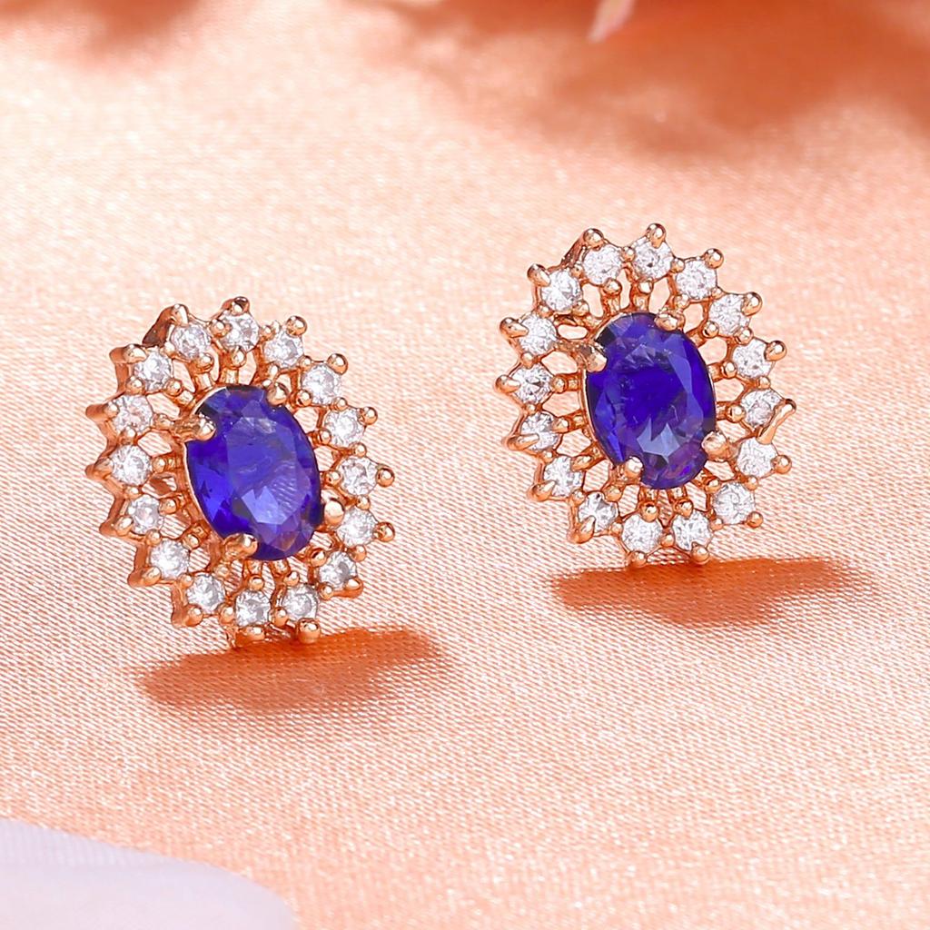 Beautiful Estele Round Designer Stud Earrings Rose Gold Plated With Blue Stones For Women