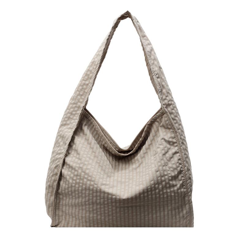 Waffle bag bag women's lazy style fashion shoulder bag large capacity leisure commuter tote bag