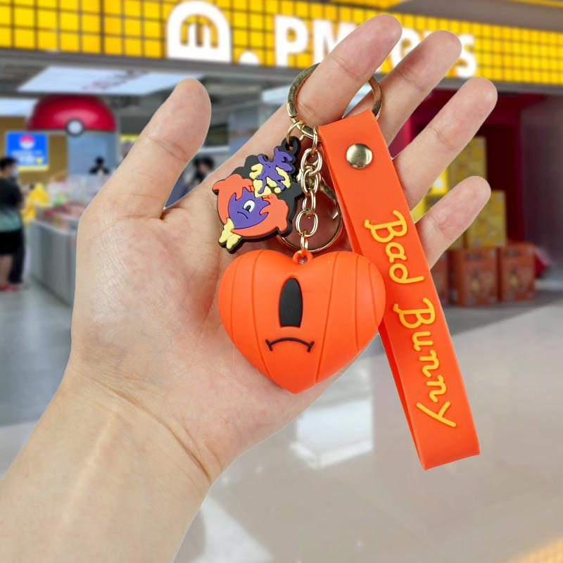 

Badbunny Cartoon Playful Keychain With Red Heart Pvc Rubber Key Holder Style A