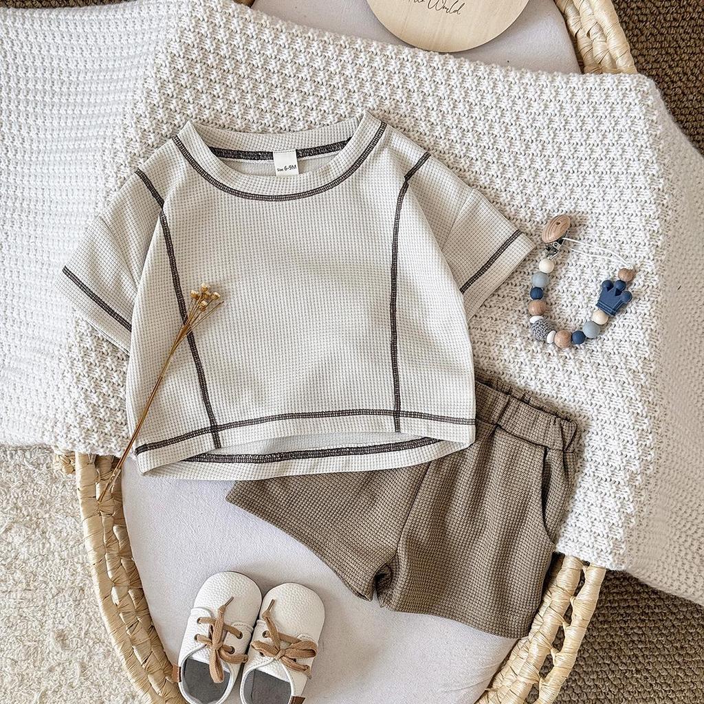 Korean Chic 2026 Summer Children's Waffle Knit Set: Short Sleeve T-shirt & Baby Shorts for Boys and Girls.