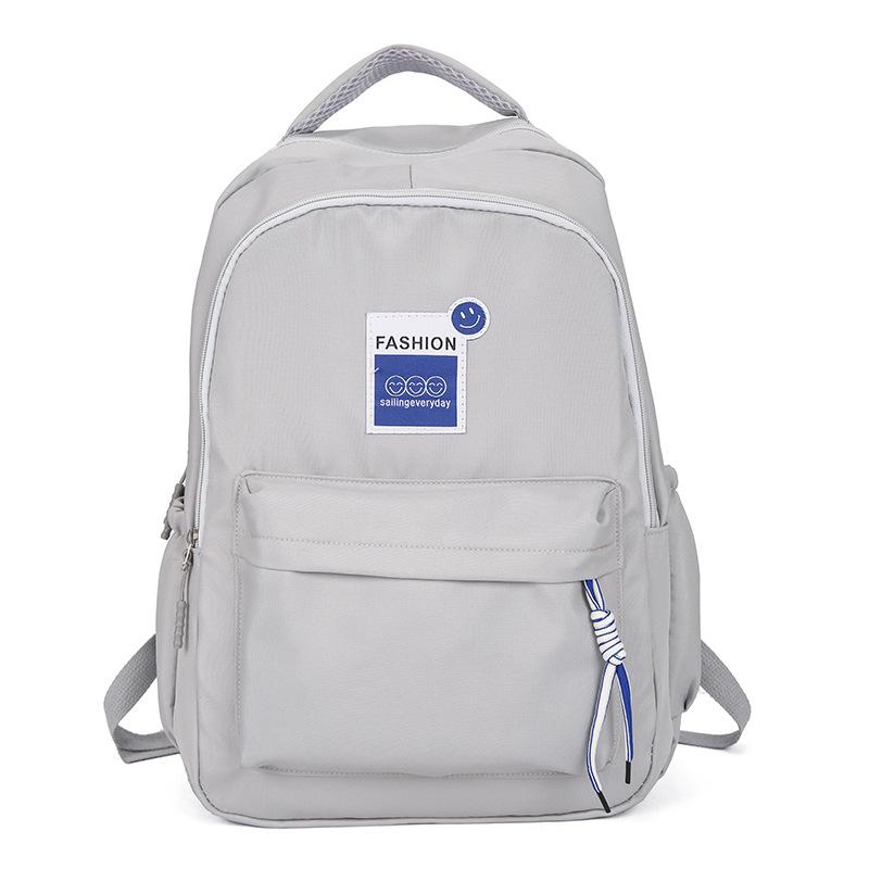 

Школьный рюкзак 2024 новый рюкзак повседневный простой студенческий стиль рюкзак для ученика средней школы сумка большой вместимости серый