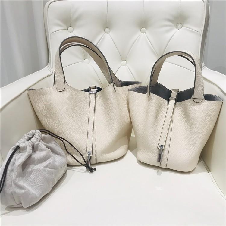 2023 Nowa damska torba ze skóry bydlęcej pierwszej jakości, wzór liczi, koszyk warzywny, worek typu bucket bag, modna i prosta, codzienna torebka