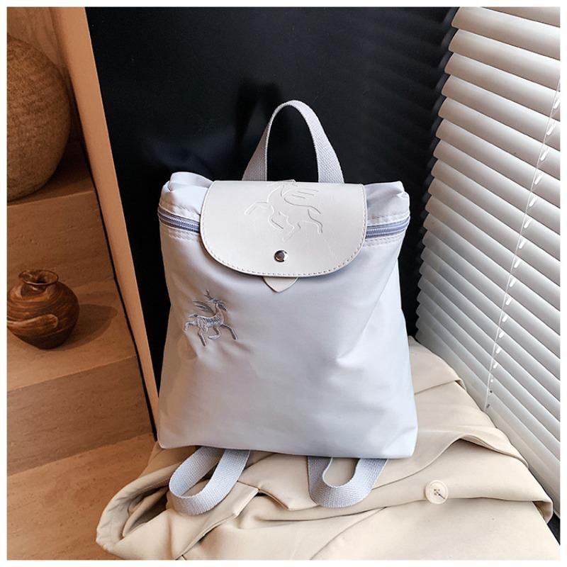 Tide Pendler-Tasche weibliche College-Studentin lässiger Rucksack Stickerei Farbabstimmung faltbar tragbar schräger Umhänge-Rucksack weiblich
