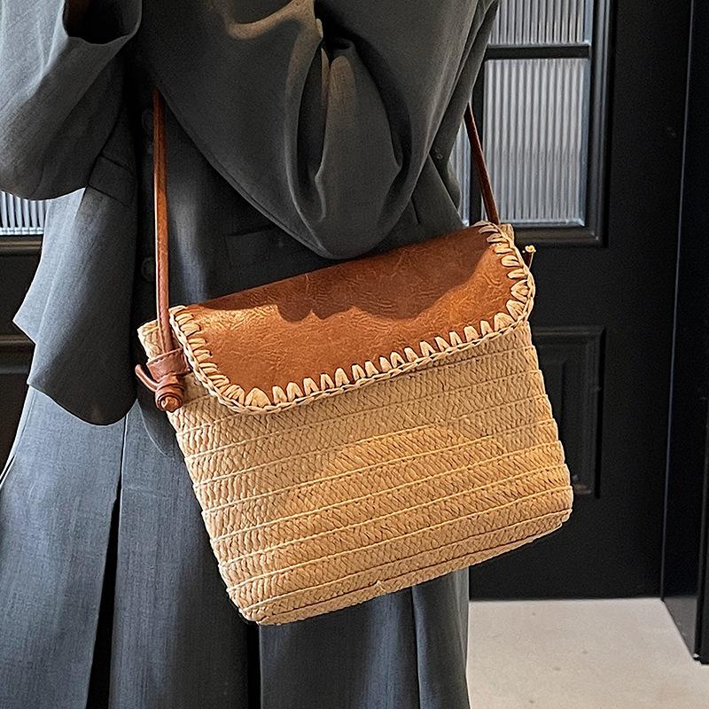 Spring and summer new Korean version ins wind straw woven bucket bag niche casual texture Mori holiday wind messenger bag women
