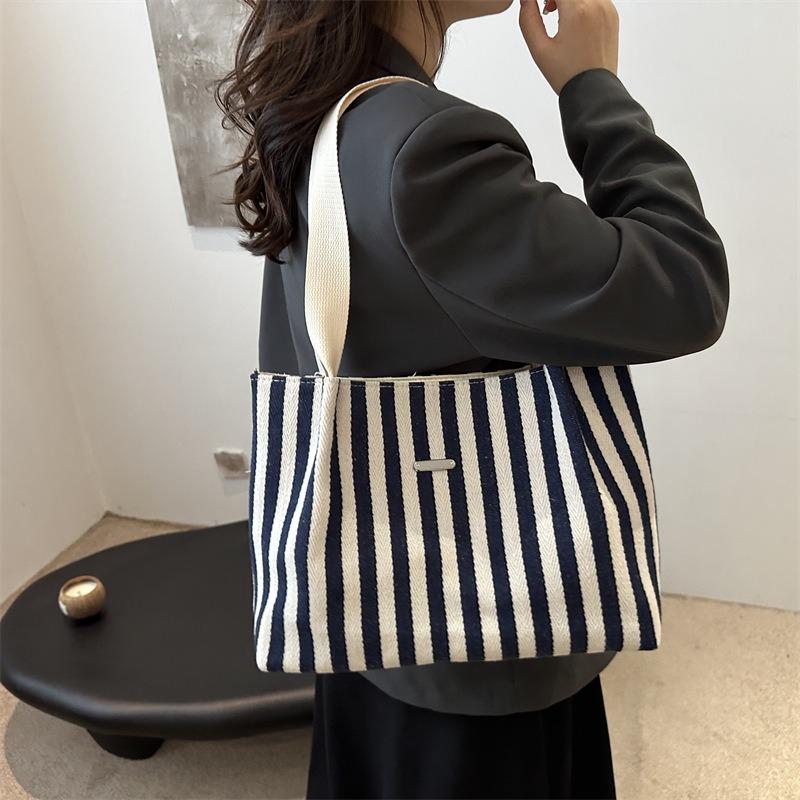 Korean version of retro literary and simple small fresh stripes casual fashion foreign style large capacity shoulder portable tote women's bag