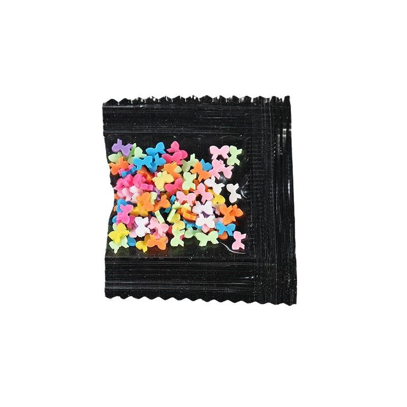 Cartoon Polymer Clay Slices: Butterfly, Flower, Moon Shapes for DIY Nail Art Accessories.