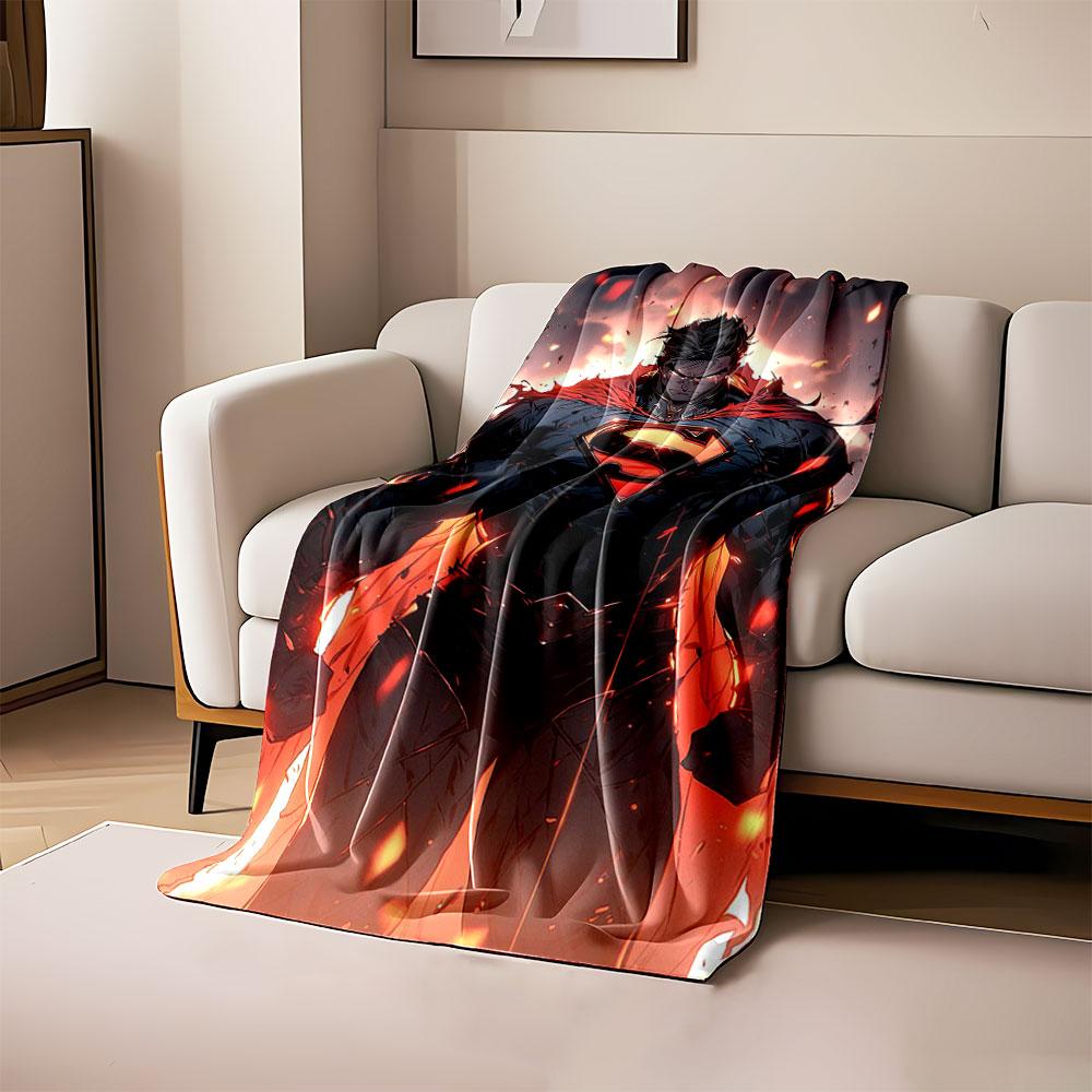 

A strong figure with glowing eyes, a red cape, and flames surrounding him. for all seasons blanket lunch break throw gift 80cm x 120cm