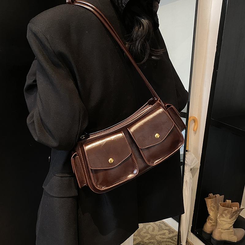 Niche High-end Multi-pocket Locomotive Bag 2025 New Temperament Shoulder Armpit Bag Commuter Messenger Baguette Bag