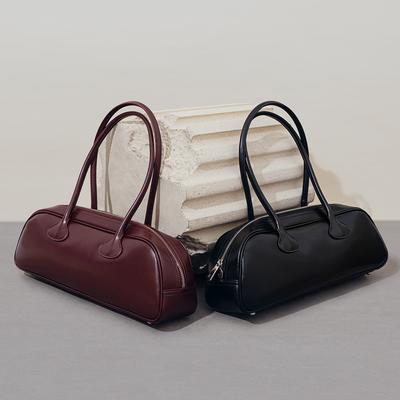 Wind-Nische Retro Bowlingtasche, neue vielseitige Rindsleder-Schulter-Achseltasche, Baguette-Tasche mit großem Fassungsvermögen