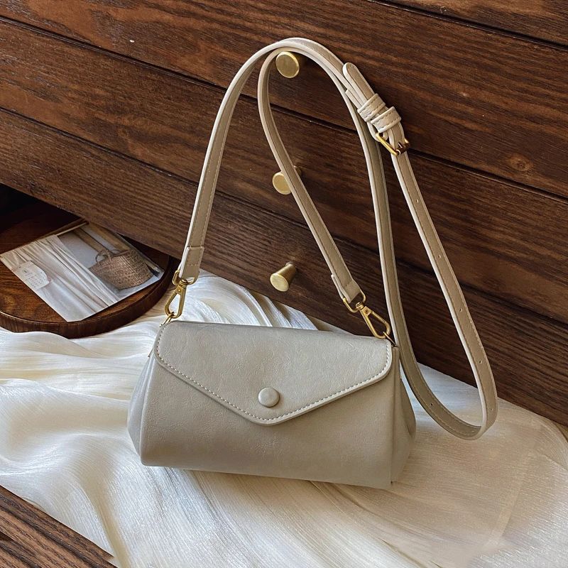 Vintage 2025 new shoulder bag temperament versatile casual simple commuting soft leather organ bag women's messenger bag