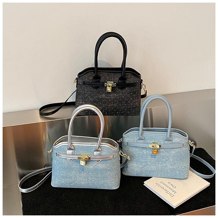 Hand bag women's 2025 new trendy high-end sense retro fashion versatile commuter shoulder bag crossbody bucket bag