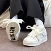 Vielseitige Plattform Casual Sport Board Schuhe Frühling neu Nische originell beige bedruckte Brotschuhe