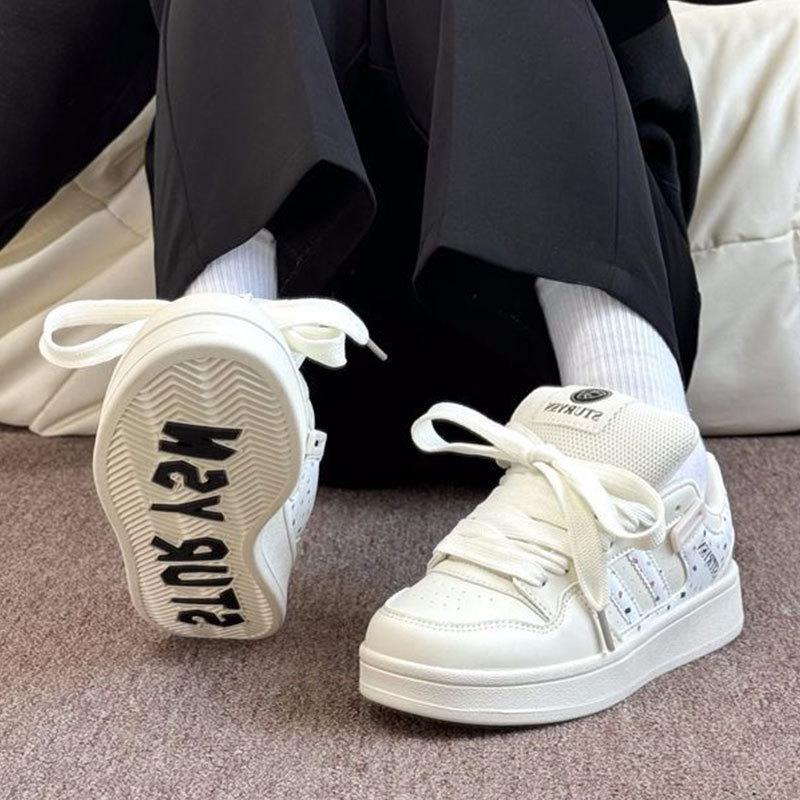 Vielseitige Plattform Casual Sport Board Schuhe Frühling neu Nische originell beige bedruckte Brotschuhe
