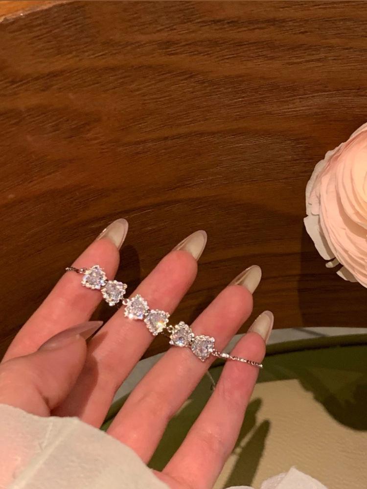 Elegante Bracciale di Lusso Leggero con Cucitura a Fiocco di Zirconi
