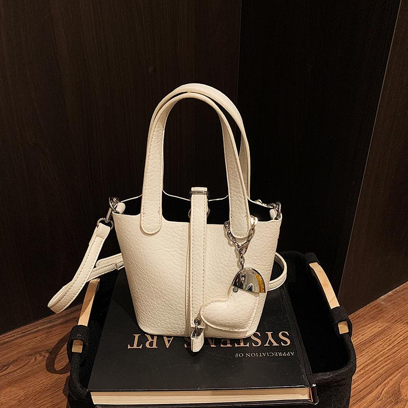 2025 Spring New Lychee Pattern Simple Commuter Handbag Women's High-end Fashion Versatile Messenger Bucket Bag
