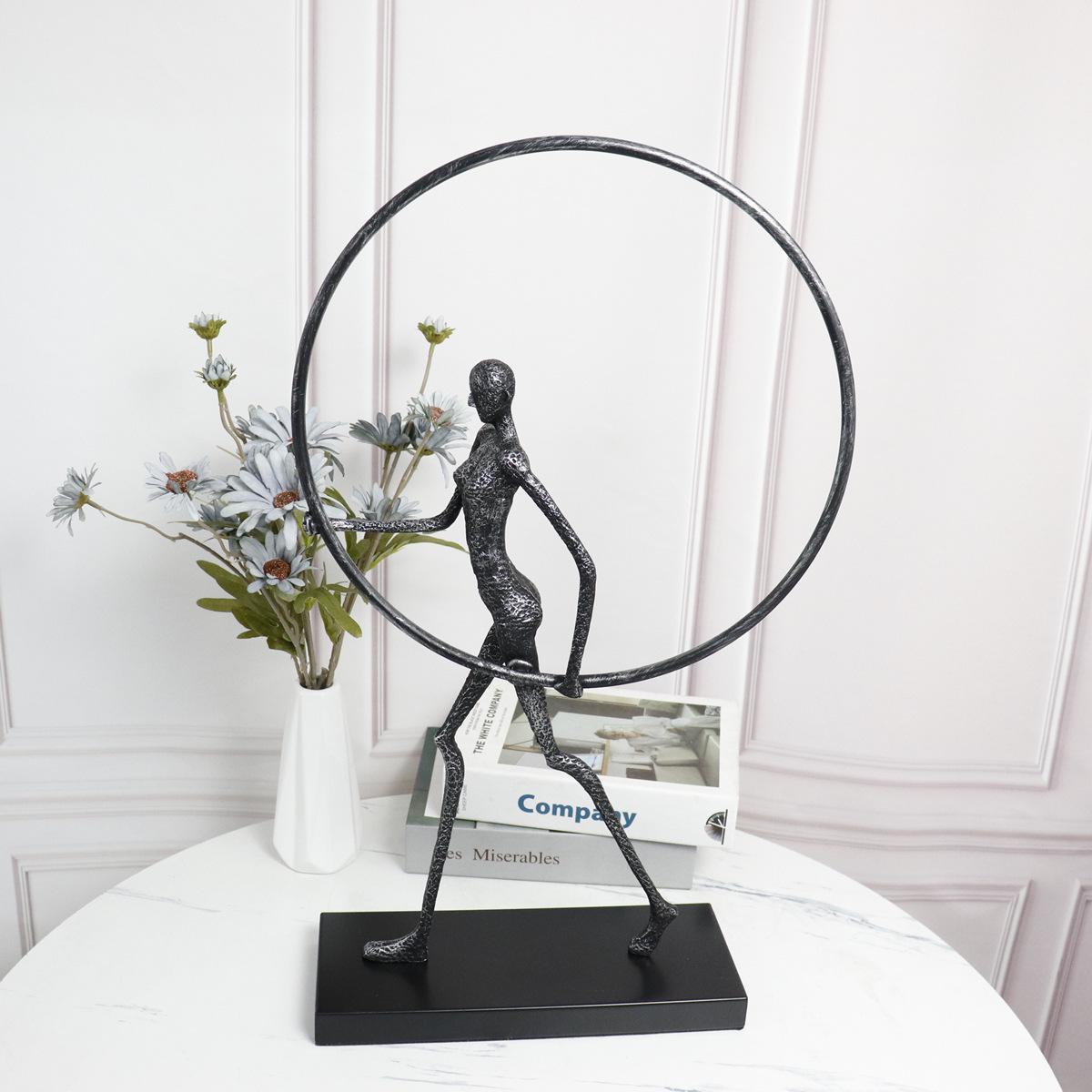 

Abstract Black Figurine with Rings - Modern Decorative Accent for Home or Office