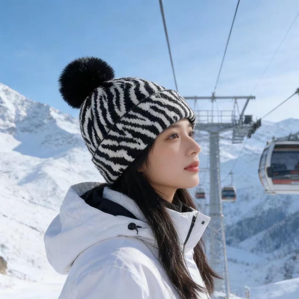 Zebra pattern hairball knitted hat women's autumn and winter retro versatile face small wool hat cold-proof warm ear hat