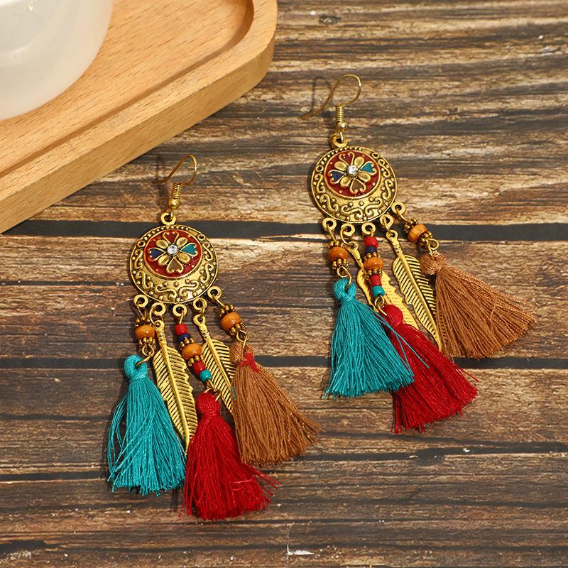 Bohemian Faux Silver Feather Tassel Mosquito Coil Earrings: Summer Retro Ethnic Ear Jewelry