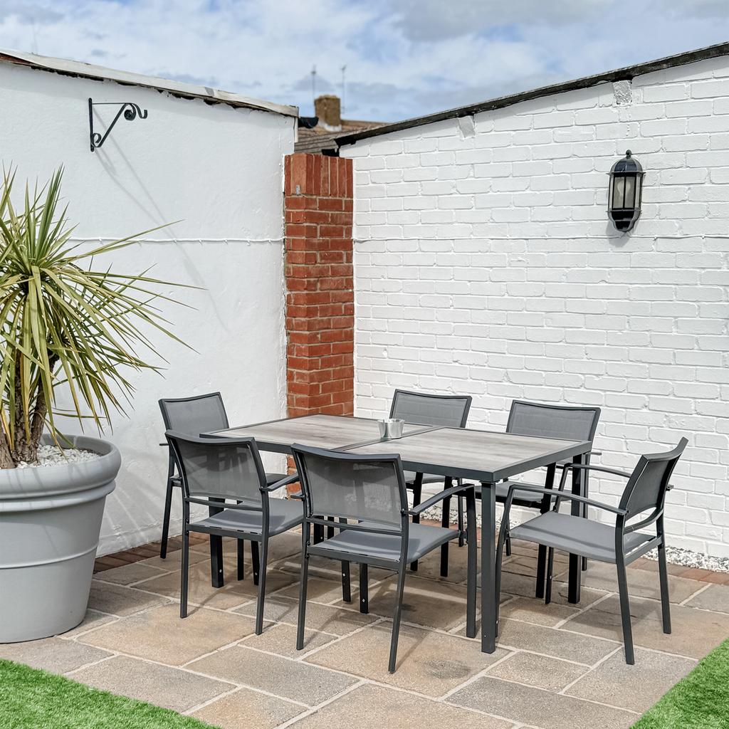 Seven Piece Casual Outdoor Dining Set With Wood Effect Table Grey