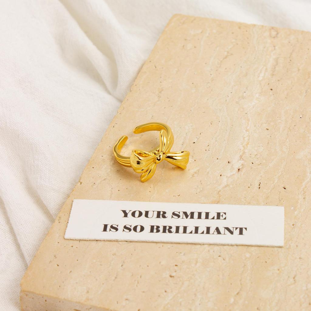 Srebrne i złote kolczyki sztyfty z kokardką o lekkim luksusowym eleganckim designie - Prosty i wszechstronny otwarty pierścionek.