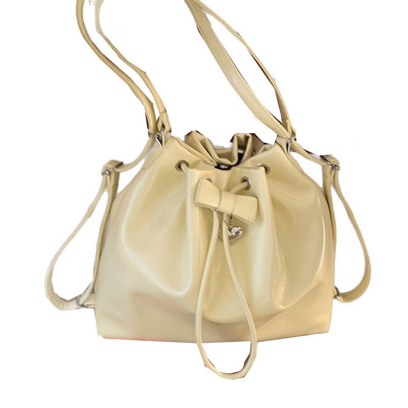 Korean version of large-capacity bucket bag 2025 new solid color niche simple casual shoulder bag multi-functional backpack