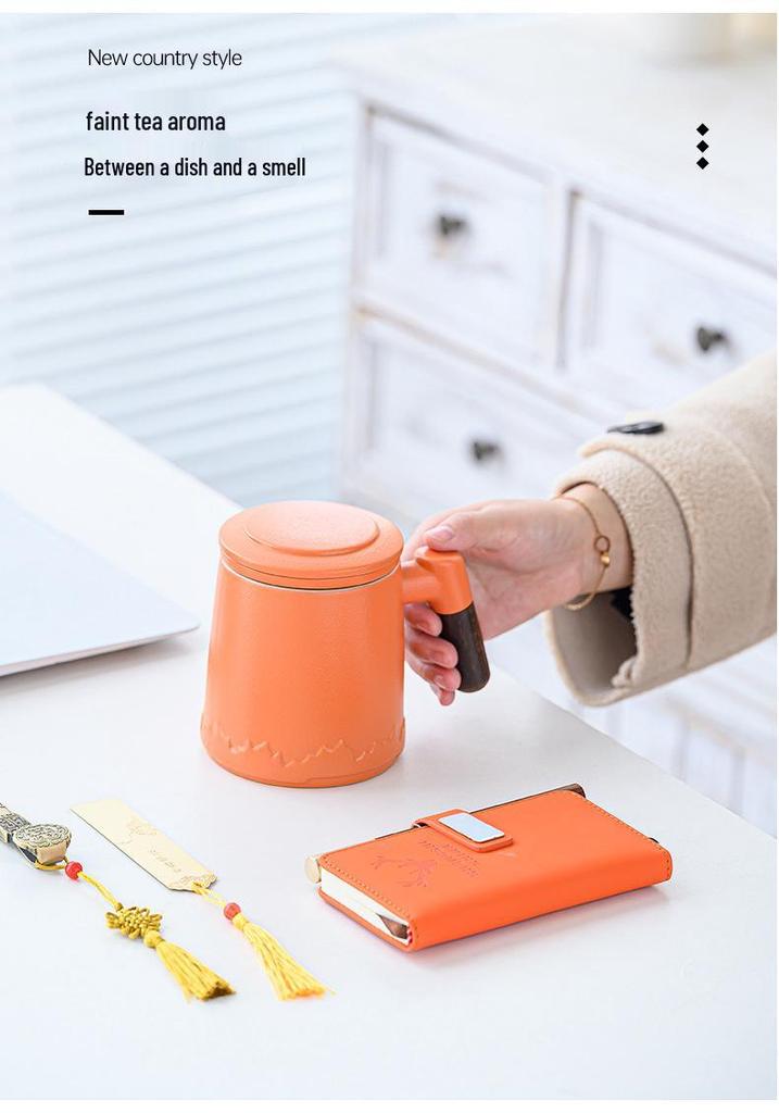 Orange Leather Gift Box: Ceramic Mug Set with Lid & Tea Infuser, Customizable Business Gift.