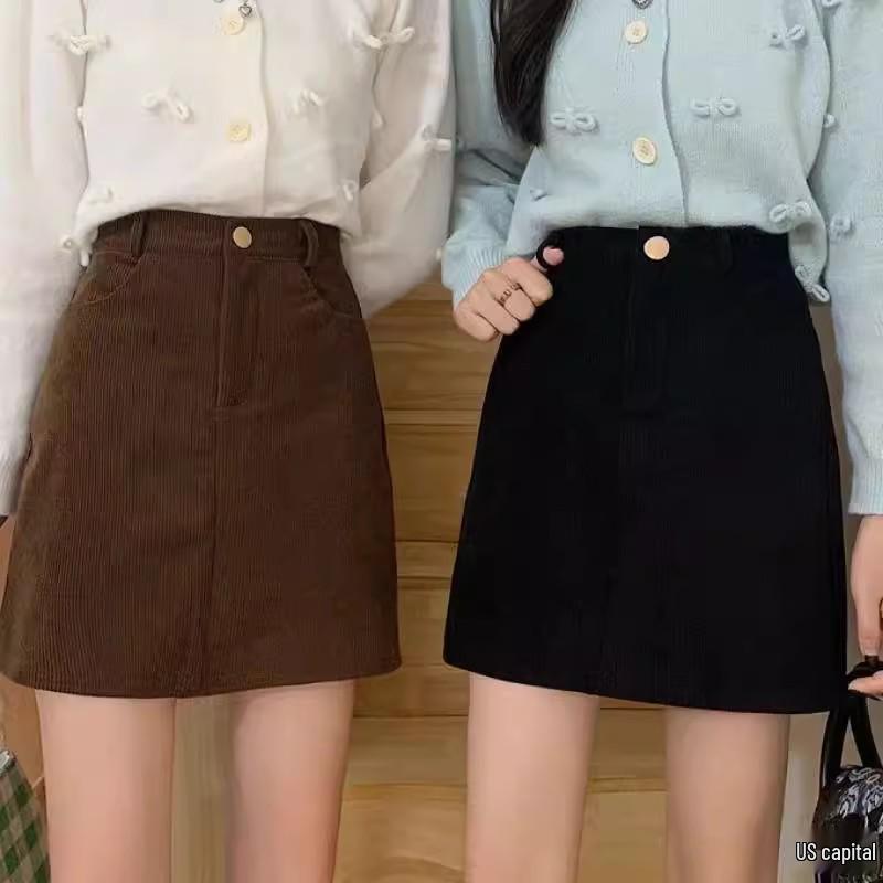 Khaki Corduroy A-Line Midi Skirt - New High-Waisted Slimming Black Mini Skirt, Anti-Exposure Hip-Hugging Design for Autumn and Spring.