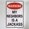 Warning My Neighbors Is a Jackass (Typo) White Rectangular Metal Tin Sign with Black Border and Silver Screws - Home Bar Man Cav