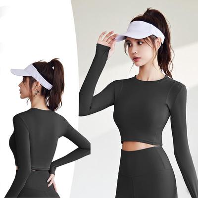 Camisetas de Yoga de manga larga para mujer, camisetas deportivas sólidas, Top de Yoga y gimnasio de alta elasticidad, Top corto deportivo transpirable, ropa deportiva de secado rápido