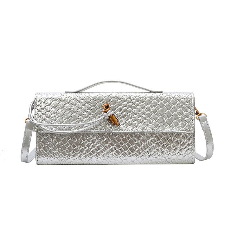 

New woven bag single shoulder baguette bag niche high-end horizontal hand-held dinner bag crossbody versatile temperament bag срібний