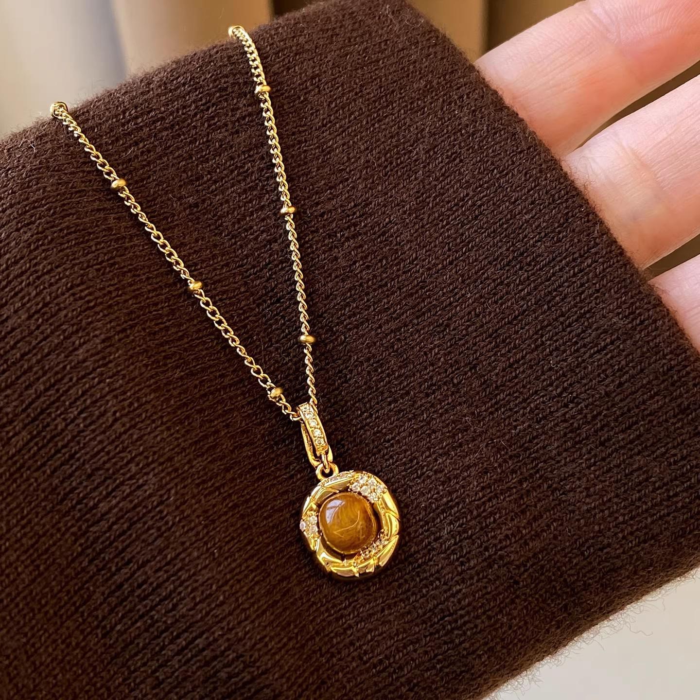French Tiger Eye Geometric Pendant Sweater Necklace - Elegant, Unique, Versatile Design.