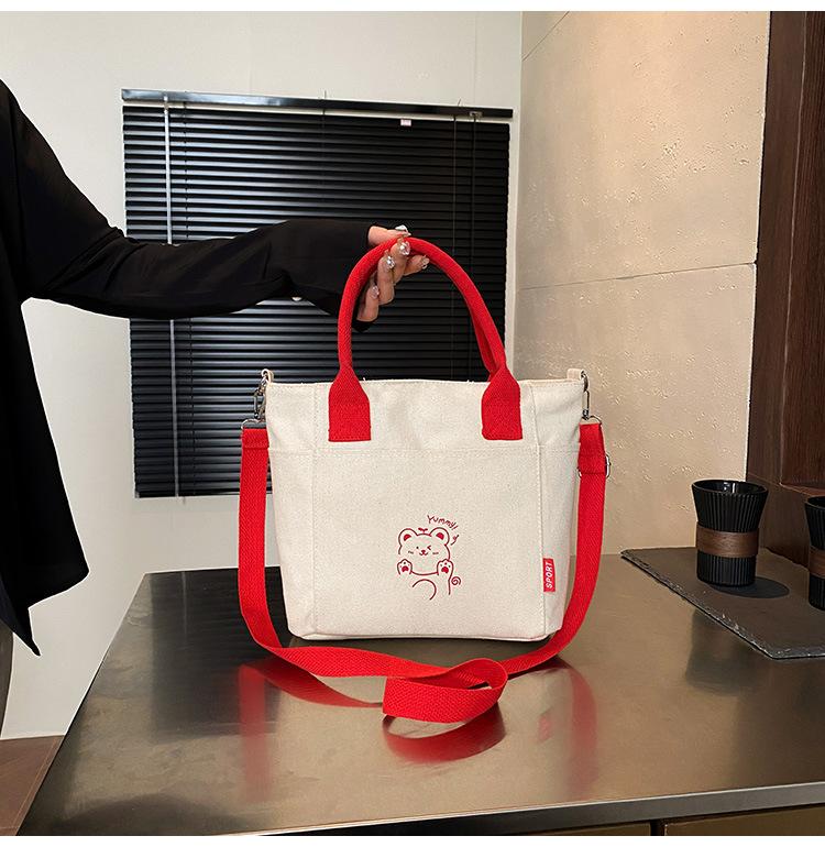 Korean Contrasting Color Portable Canvas Bag Women's 2025 New Casual Messenger Bag Popular Literature Cute Commuter Bag